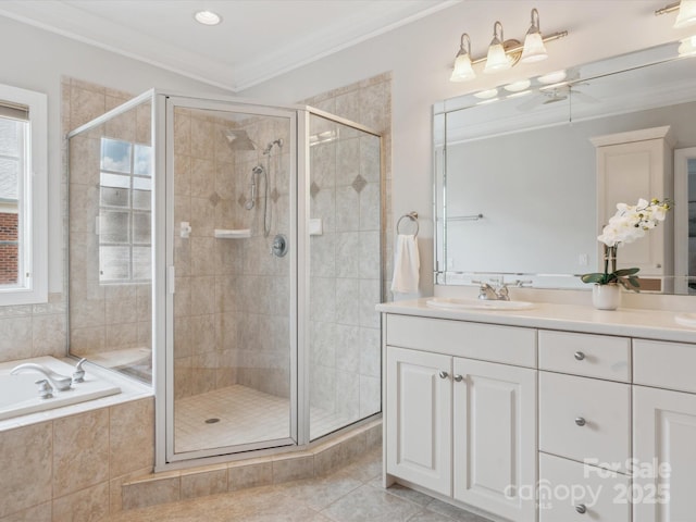 705 Congressional Ln, Fort Mill, SC 29708 - bathroom featuring vanity, a shower stall, a bath, crown molding, and tile patterned floors