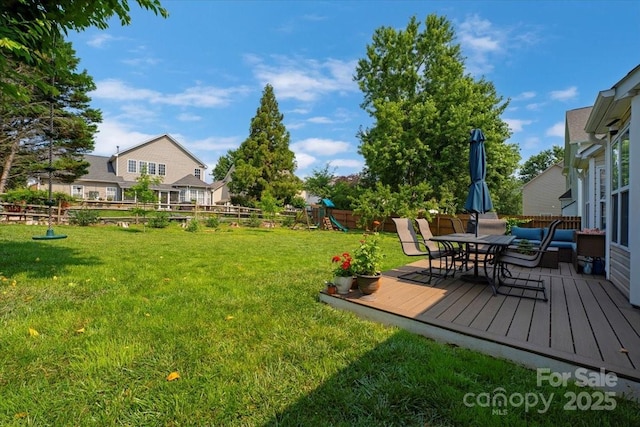 4797 Chesney St NW, Concord, NC 28027 - view of yard with a playground, a deck, and outdoor dining area