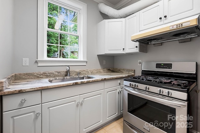 3324 Greenhurst Dr, Weddington, NC 28104 - kitchen featuring stainless steel gas range oven, a sink, under cabinet range hood, white cabinetry, and ornamental molding