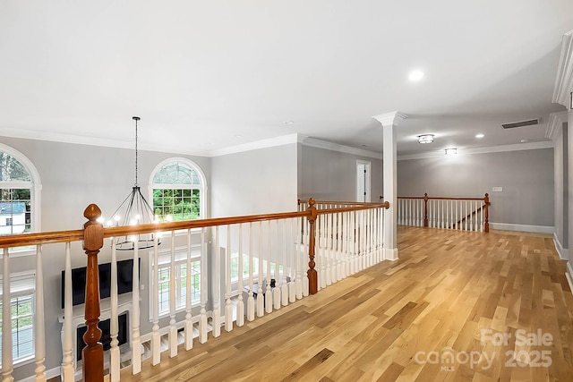 3324 Greenhurst Dr, Weddington, NC 28104 - hall with a chandelier, recessed lighting, wood finished floors, an upstairs landing, and ornamental molding