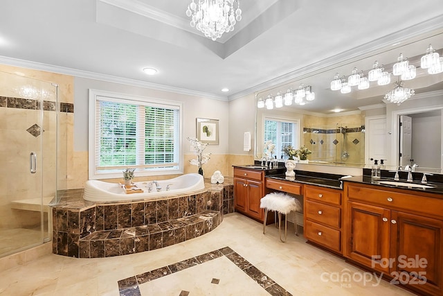 3324 Greenhurst Dr, Weddington, NC 28104 - bathroom featuring vanity, a shower stall, a bath, crown molding, and inlaid floor details