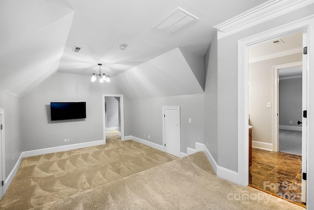 3324 Greenhurst Dr, Weddington, NC 28104 - bonus room with light carpet, vaulted ceiling, baseboards, and a chandelier