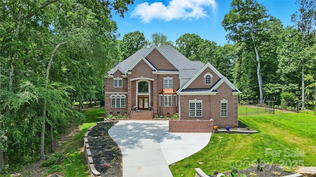 3324 Greenhurst Dr, Weddington, NC 28104 - georgian-style home featuring brick siding