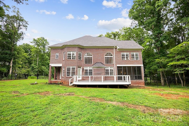 3324 Greenhurst Dr, Weddington, NC 28104 - rear view of house featuring a sunroom, brick siding, and a deck