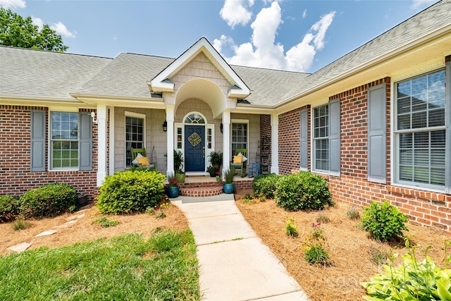 133 Upland Dr, Statesville, NC 28625 - doorway to property featuring brick siding and a shingled roof