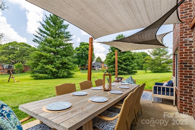 133 Upland Dr, Statesville, NC 28625 - view of patio with outdoor dining area and view of scattered trees