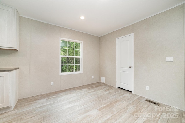 5090 Beaver Dam Way, Bessemer City, NC 28016 - empty room with light wood-type flooring, crown molding, and recessed lighting