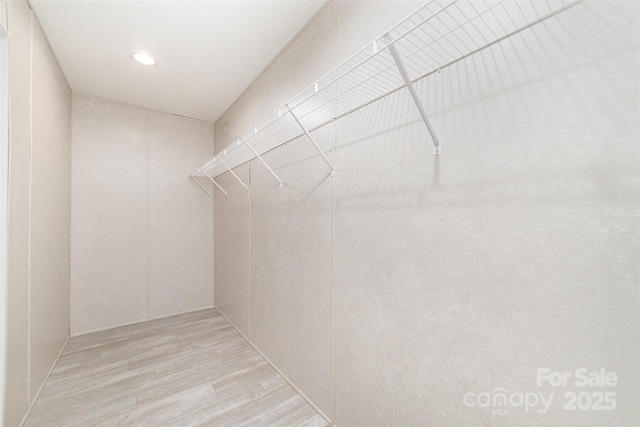 5090 Beaver Dam Way, Bessemer City, NC 28016 - spacious closet with light wood-style floors