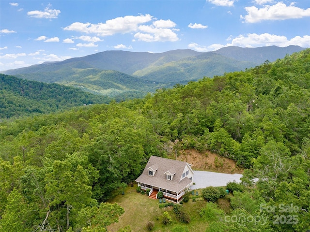 138 Down To Earth Dr, Burnsville, NC 28714 - view of subject property with a forest and mountains