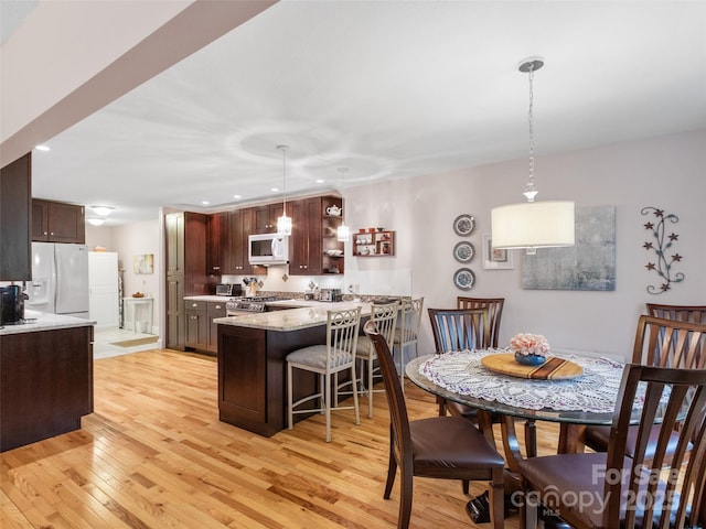 138 Down To Earth Dr, Burnsville, NC 28714 - dining area featuring light wood-style floors and recessed lighting