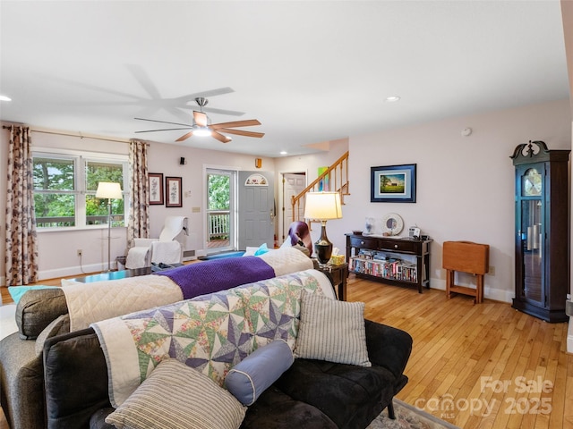 138 Down To Earth Dr, Burnsville, NC 28714 - living area featuring stairs, light wood finished floors, baseboards, a ceiling fan, and recessed lighting