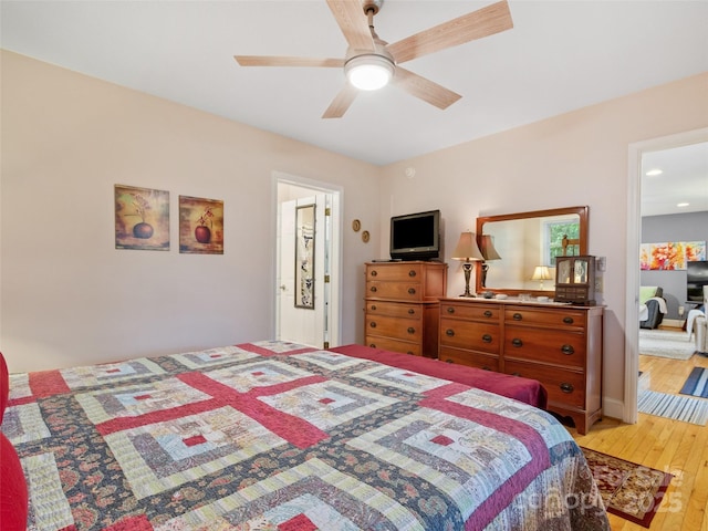 138 Down To Earth Dr, Burnsville, NC 28714 - bedroom with light wood-style floors and ceiling fan
