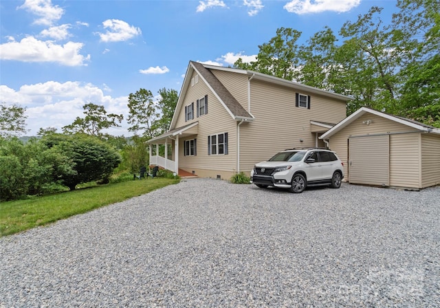 138 Down To Earth Dr, Burnsville, NC 28714 - view of property exterior featuring an outdoor structure and gravel driveway