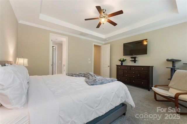 1906 Pensco Pond Ct, Waxhaw, NC 28173 - bedroom featuring a raised ceiling, carpet floors, a ceiling fan, and ornamental molding