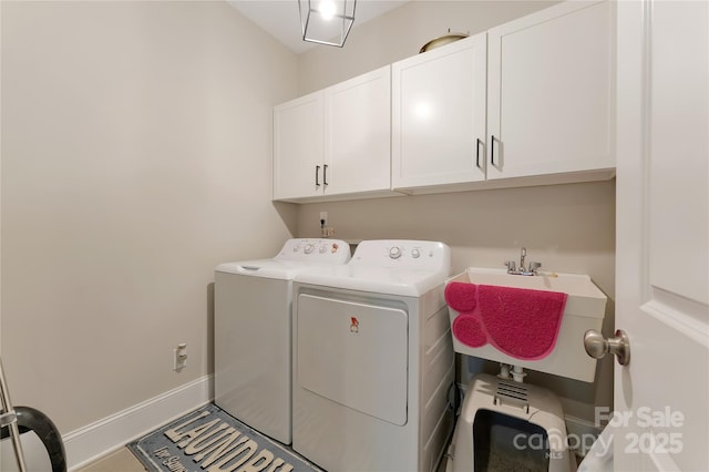 1906 Pensco Pond Ct, Waxhaw, NC 28173 - laundry room with cabinet space and washing machine and dryer