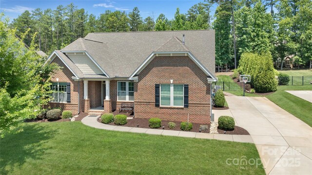 1906 Pensco Pond Ct, Waxhaw, NC 28173 - craftsman inspired home featuring brick siding and roof with shingles