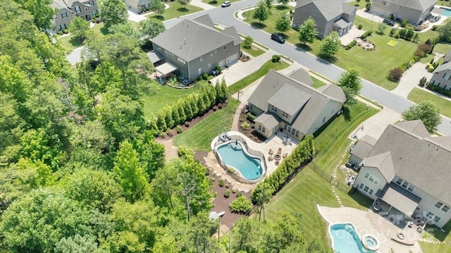 1906 Pensco Pond Ct, Waxhaw, NC 28173 - aerial perspective of suburban area with a pool area