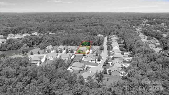 1906 Pensco Pond Ct, Waxhaw, NC 28173 - aerial perspective of suburban area featuring a forest and property parcel outlined