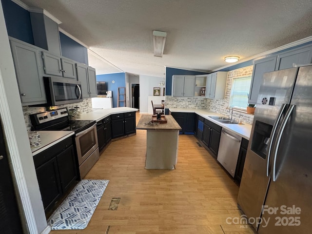13211 Asbury Chapel Rd, Huntersville, NC 28078 - kitchen with stainless steel appliances, a sink, a kitchen island, backsplash, and a textured ceiling