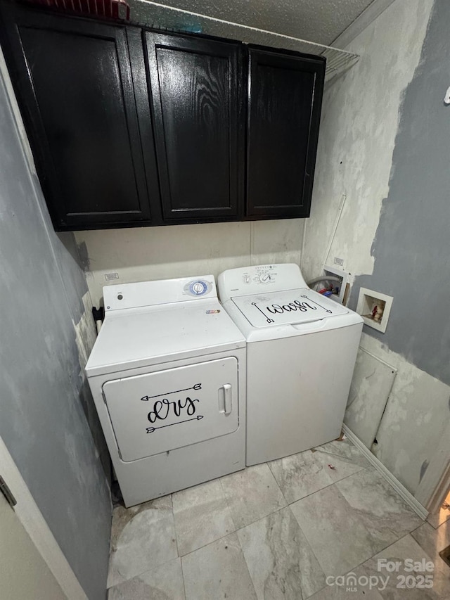 13211 Asbury Chapel Rd, Huntersville, NC 28078 - laundry room with cabinet space and washer and dryer