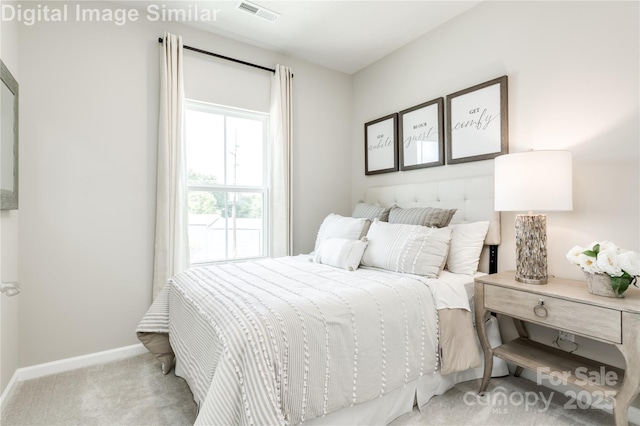2342 Nadine Ln, Charlotte, NC 28216 - carpeted bedroom featuring baseboards
