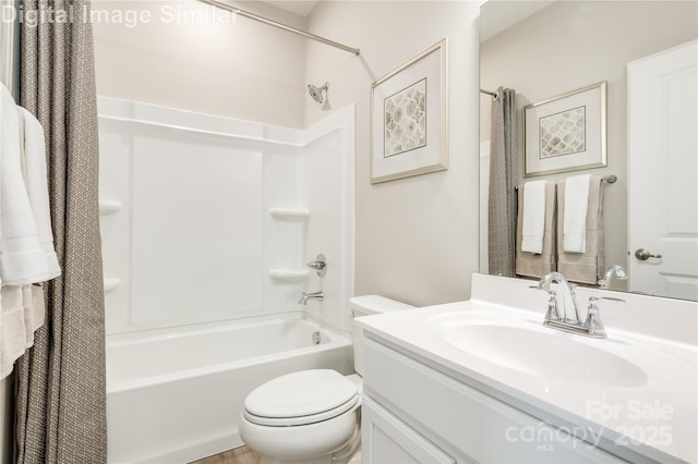 2342 Nadine Ln, Charlotte, NC 28216 - bathroom featuring shower / tub combo with curtain, vanity, and toilet