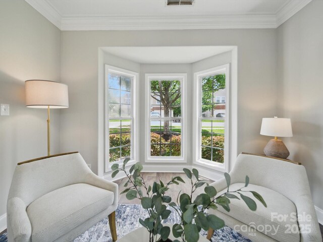 8304 Prescott Glen Pkwy, Waxhaw, NC 28173 - sitting room with wood finished floors, ornamental molding, and baseboards