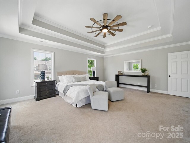 8304 Prescott Glen Pkwy, Waxhaw, NC 28173 - carpeted bedroom featuring a raised ceiling, multiple windows, crown molding, and baseboards