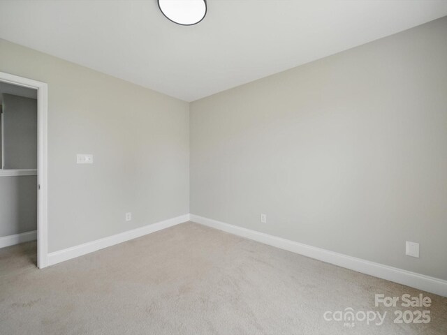 8304 Prescott Glen Pkwy, Waxhaw, NC 28173 - empty room with light carpet and baseboards