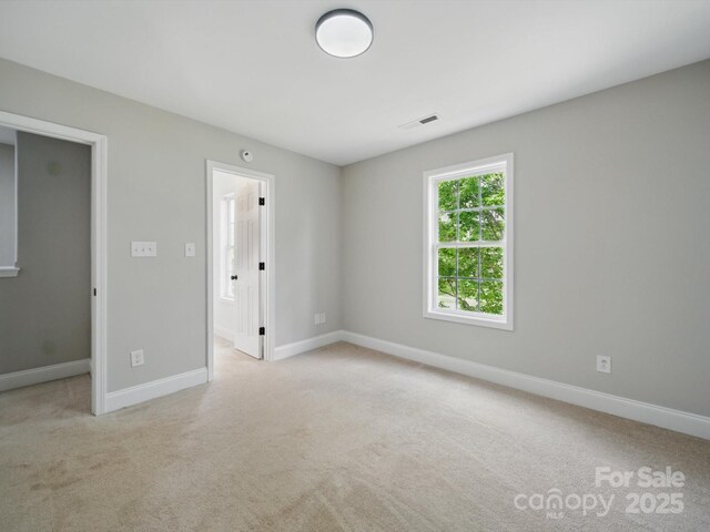 8304 Prescott Glen Pkwy, Waxhaw, NC 28173 - unfurnished room featuring carpet floors and baseboards