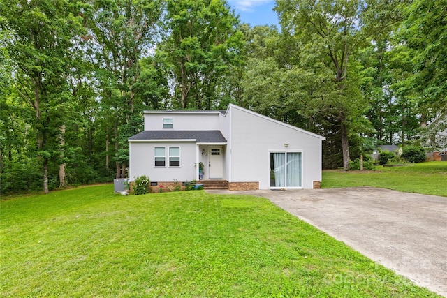 221 Reliance Rd, Kings Mountain, NC 28086 - mid-century home with roof with shingles, a front yard, stucco siding, and crawl space