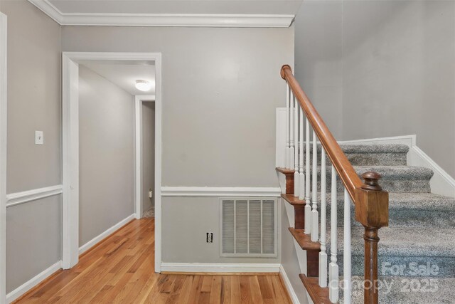 1517 E Barden Rd, Charlotte, NC 28226 - staircase featuring wood finished floors and crown molding