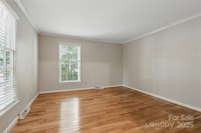1517 E Barden Rd, Charlotte, NC 28226 - spare room with ornamental molding and light wood-style floors