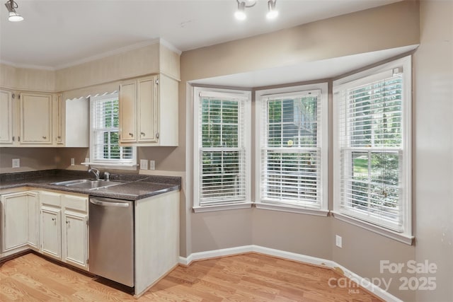 1517 E Barden Rd, Charlotte, NC 28226 - kitchen with stainless steel dishwasher, dark countertops, light wood-type flooring, ornamental molding, and cream cabinetry