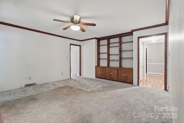 1517 E Barden Rd, Charlotte, NC 28226 - carpeted empty room featuring a ceiling fan and ornamental molding