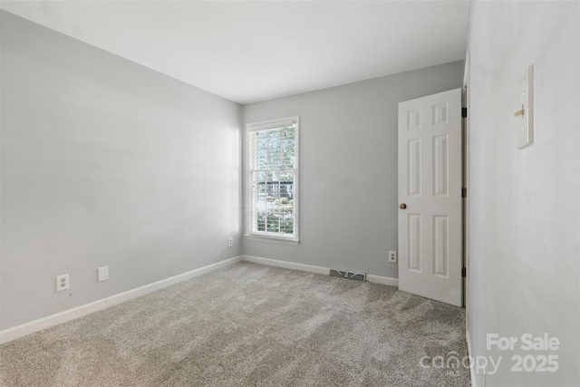 1517 E Barden Rd, Charlotte, NC 28226 - carpeted empty room with baseboards