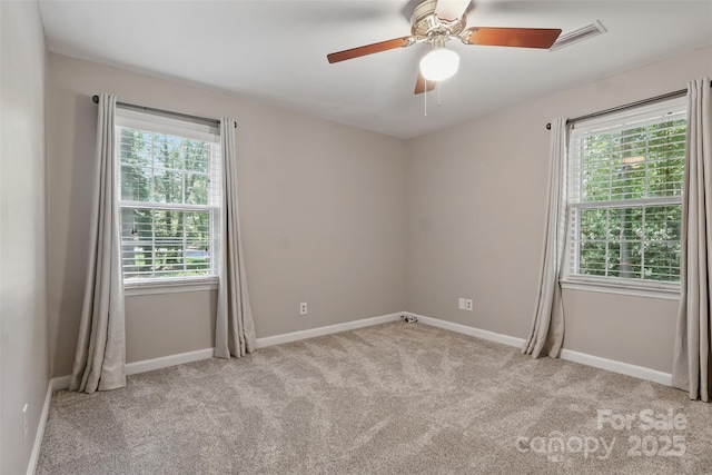 1517 E Barden Rd, Charlotte, NC 28226 - empty room with plenty of natural light, carpet, and a ceiling fan
