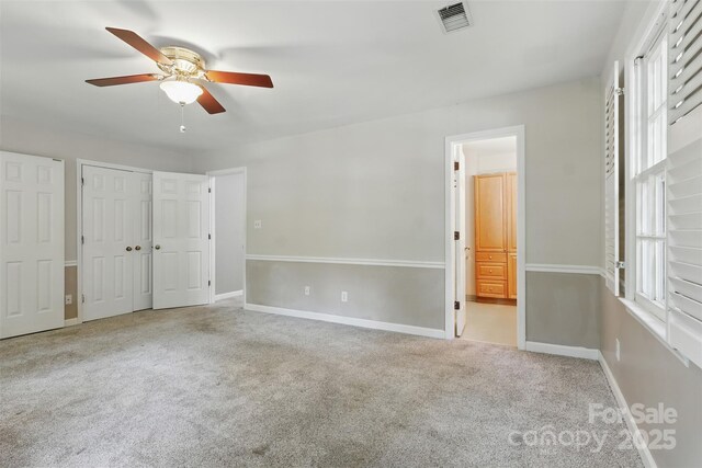 1517 E Barden Rd, Charlotte, NC 28226 - unfurnished bedroom featuring carpet, ensuite bathroom, and ceiling fan