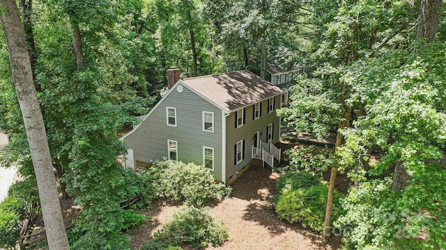 1517 E Barden Rd, Charlotte, NC 28226 - view of side of property featuring a chimney and roof with shingles