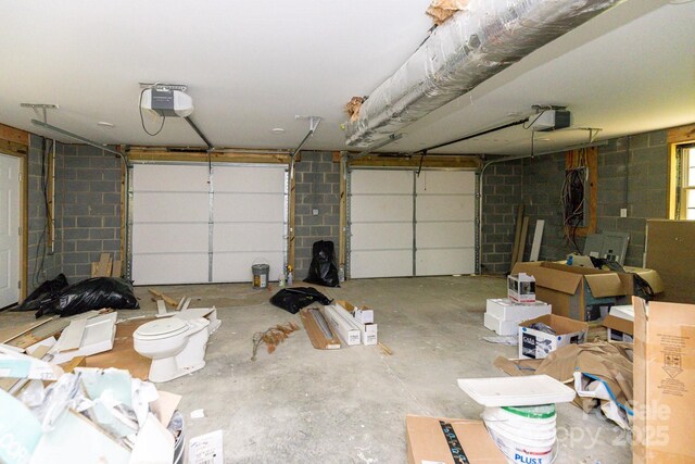 109 Tumblebug Trail Rd, Flat Rock, NC 28731 - garage with a garage door opener and concrete block wall