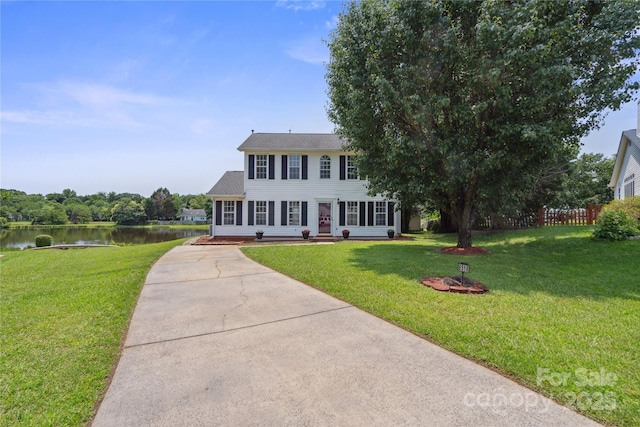 6516 Laurel Springs Ct, Charlotte, NC 28227 - colonial house featuring a water view and concrete driveway