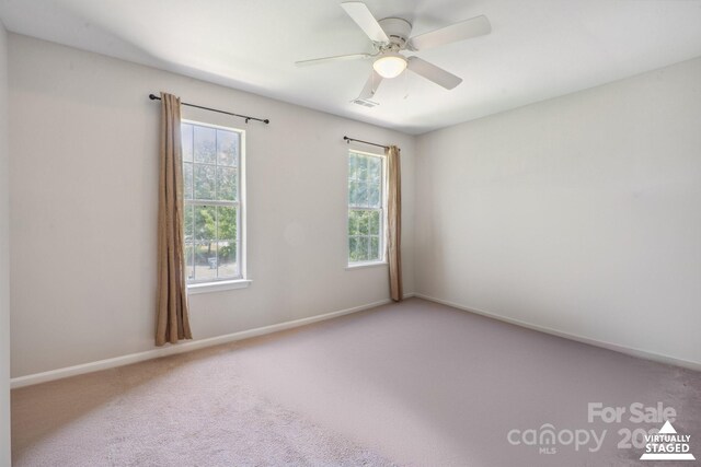 6516 Laurel Springs Ct, Charlotte, NC 28227 - carpeted empty room featuring a ceiling fan and baseboards