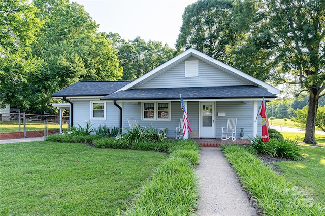 100 S Rudisill Ave, Cherryville, NC 28021 - view of front of home with a porch, a shingled roof, and a gate