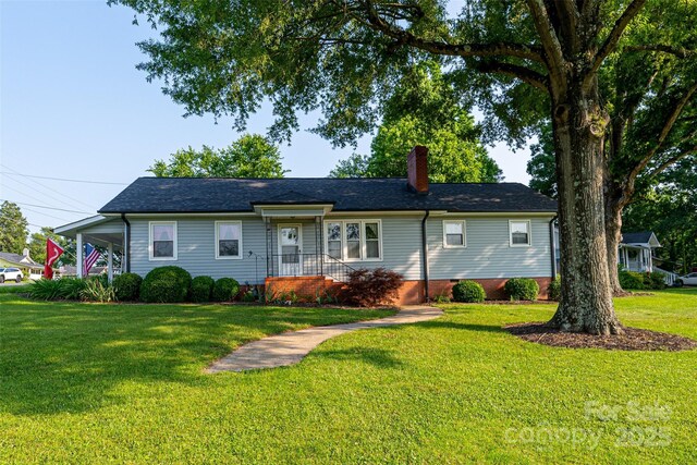 100 S Rudisill Ave, Cherryville, NC 28021 - ranch-style home featuring a chimney and a front yard