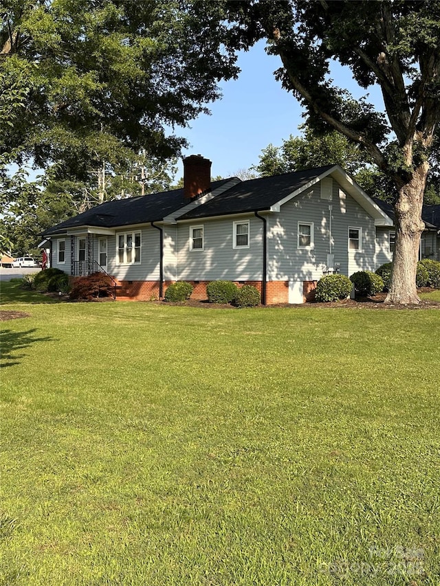 100 S Rudisill Ave, Cherryville, NC 28021 - view of front facade featuring a chimney, a front yard, and crawl space