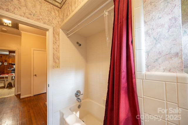 100 S Rudisill Ave, Cherryville, NC 28021 - full bathroom with shower / bathtub combination with curtain, hardwood / wood-style floors, wallpapered walls, and crown molding
