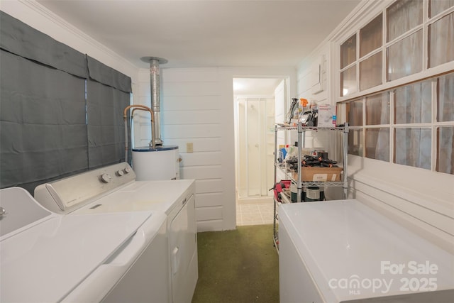 100 S Rudisill Ave, Cherryville, NC 28021 - washroom with washing machine and clothes dryer, dark carpet, and gas water heater