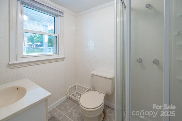 100 S Rudisill Ave, Cherryville, NC 28021 - full bath with a shower stall, crown molding, vanity, toilet, and tile walls