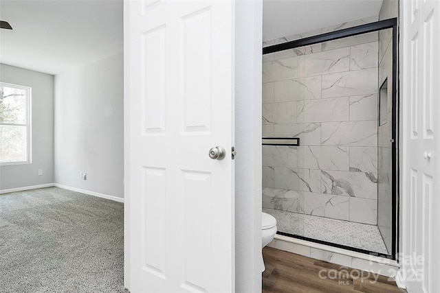 7214 Fox Point Dr, Charlotte, NC 28269 - full bath featuring a shower stall, toilet, and baseboards