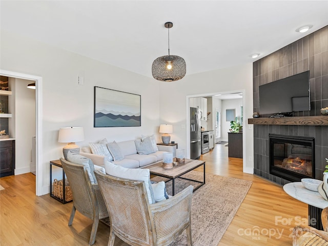 218 Water Leaf Dr, Weaverville, NC 28787 - living area with light wood finished floors and a tile fireplace
